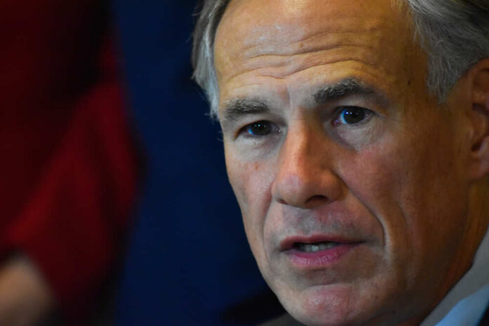 Close-up of a serious-looking political figure during a press conference