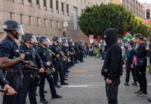 A standoff between police officers and protesters during a demonstration