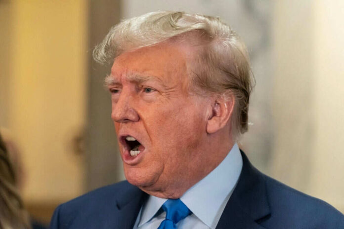 2369816081 Man speaking with mouth open in a suit
