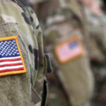 Maduro CAPTURED: International Law Crisis Unfolds Soldiers in camouflage uniforms with American flag patches