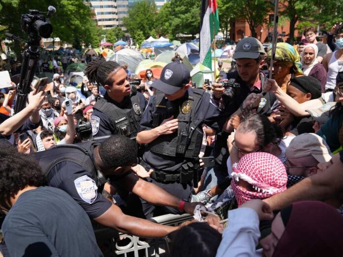 Refugee DESTROYS Protester — Sign Drops Immediately