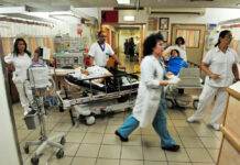 Busy hospital scene with medical staff and patients